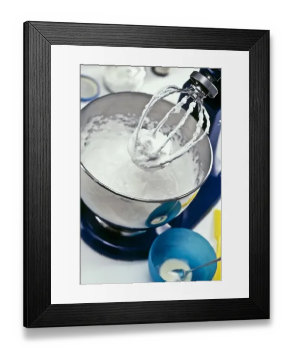 Framed Print : Beaten egg white in stainless steel mixer in kitchen setting, showing stiffness Framed Print : Beaten egg white in stainless steel mixer in kitchen setting, showing stiffness