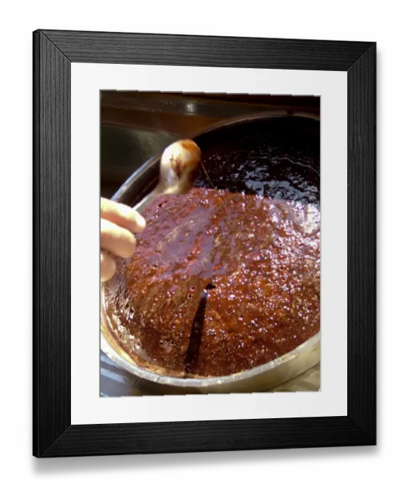 Framed Print : Rich sticky chocolate cake baked aboard Turkish gulet being dosed with chocolate