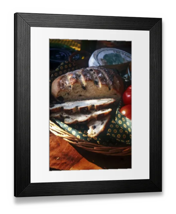 Framed Print : French olive bread with tomatoes and cheese in basket in gentle warmth of spring Framed Print : French olive bread with tomatoes and cheese in basket in gentle warmth of spring