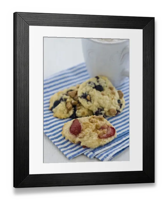 Framed Print : Soft cookies with berries and nuts on blue and white striped napkin with mug of cappucino credit Framed Print : Soft cookies with berries and nuts on blue and white striped napkin with mug of cappucino credit