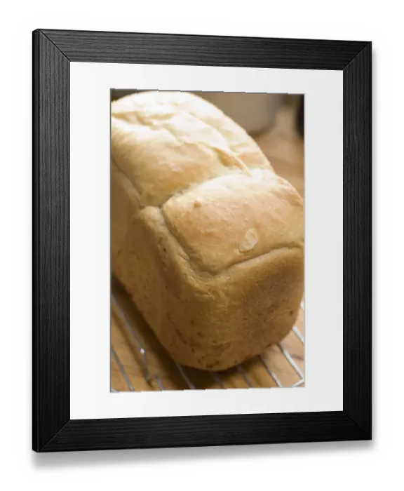 Framed Print : Freshly baked white loaf rack cooling on wire rack credit: Marie-Louise Avery / Framed Print : Freshly baked white loaf rack cooling on wire rack credit: Marie-Louise Avery /