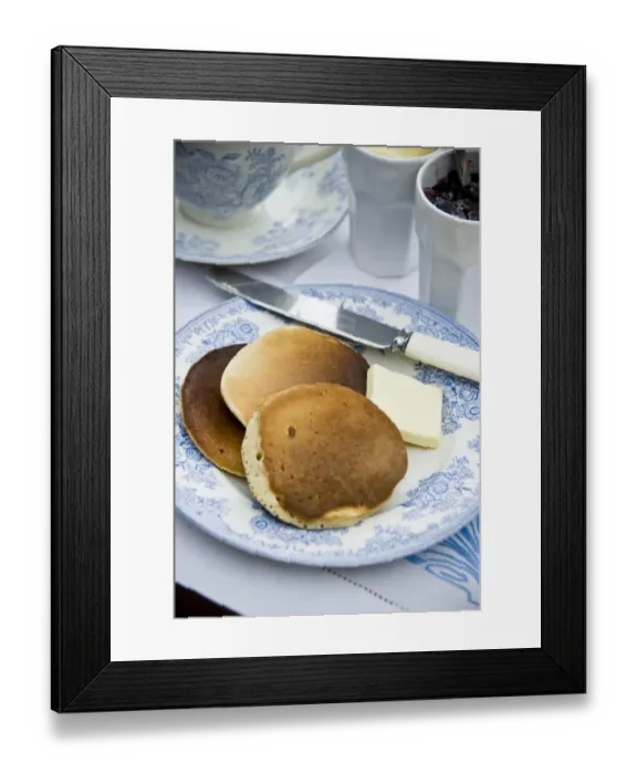 Framed Print : Teatime setting with scotch pancakes and raspberry jam credit: Marie-Louise Avery Framed Print : Teatime setting with scotch pancakes and raspberry jam credit: Marie-Louise Avery