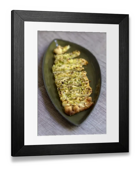 Framed Print : Freshly baked cheese straws made with grated courgette and grated emmental strewn Framed Print : Freshly baked cheese straws made with grated courgette and grated emmental strewn
