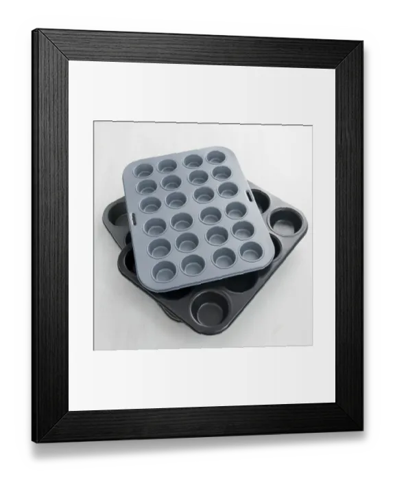 Framed Print : Non-stick metal muffin baking tins credit: Marie-Louise Avery / thePictureKitchen Framed Print : Non-stick metal muffin baking tins credit: Marie-Louise Avery / thePictureKitchen