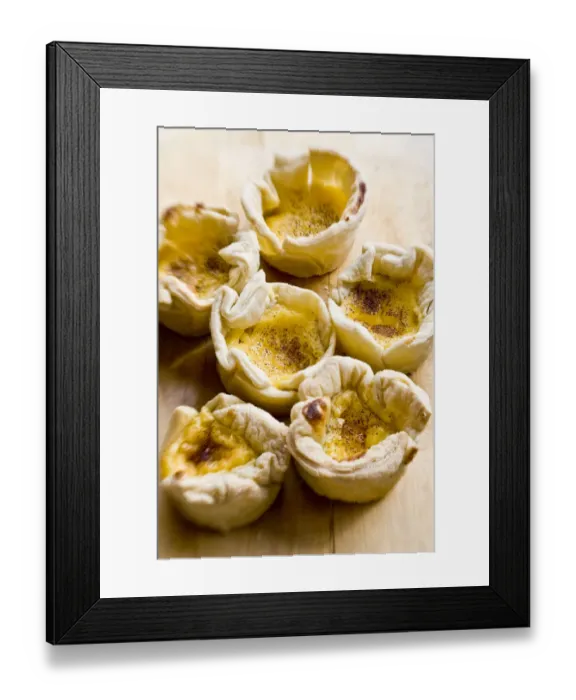 Framed Print : Home made portuguese style custard tarts with confectioners custard and puff pastry credit Framed Print : Home made portuguese style custard tarts with confectioners custard and puff pastry credit