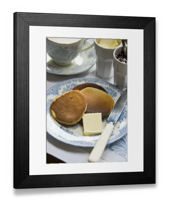 Framed Print : Teatime setting with scotch pancakes and raspberry jam credit: Marie-Louise Avery Framed Print : Teatime setting with scotch pancakes and raspberry jam credit: Marie-Louise Avery