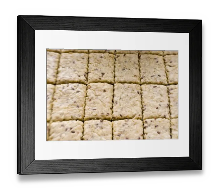 Framed Print : Cookie dough rolled out on baking sheet cut with pastry cutter, before going into oven credit Framed Print : Cookie dough rolled out on baking sheet cut with pastry cutter, before going into oven credit