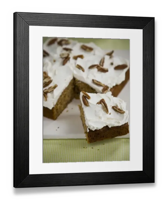 Framed Print : Passion cake with buttercream tpping with slivers of pecan nuts credit: Marie-Louise Framed Print : Passion cake with buttercream tpping with slivers of pecan nuts credit: Marie-Louise