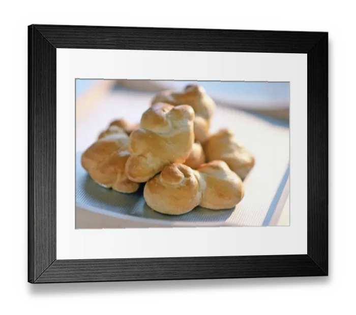 Framed Print : Pile of freshly baked twisted bread rolls credit: Marie-Louise Avery / thePictureKitchen Framed Print : Pile of freshly baked twisted bread rolls credit: Marie-Louise Avery / thePictureKitchen