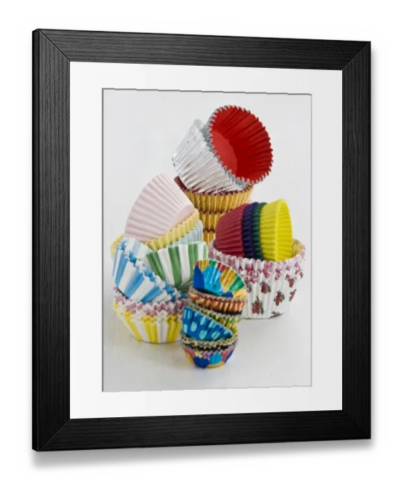 Framed Print : Stacks of decorative paper and foil cake and muffin cases credit: Marie-Louise Framed Print : Stacks of decorative paper and foil cake and muffin cases credit: Marie-Louise