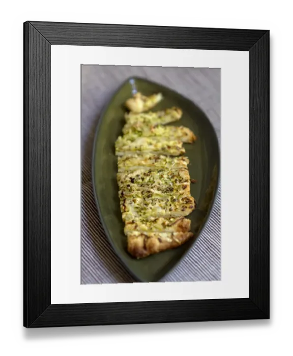 Framed Print : Freshly baked cheese straws made with grated courgette and grated emmental strewn Framed Print : Freshly baked cheese straws made with grated courgette and grated emmental strewn