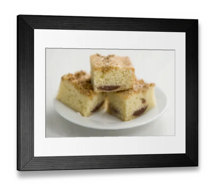 Framed Print : Three squares of fig and sesame cake on white plate credit: Marie-Louise Avery Framed Print : Three squares of fig and sesame cake on white plate credit: Marie-Louise Avery