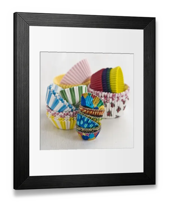 Framed Print : Stacks of decorative paper and foil cake and muffin cases credit: Marie-Louise Framed Print : Stacks of decorative paper and foil cake and muffin cases credit: Marie-Louise