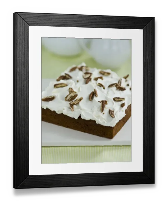 Framed Print : Passion cake with buttercream tpping with slivers of pecan nuts credit: Marie-Louise Framed Print : Passion cake with buttercream tpping with slivers of pecan nuts credit: Marie-Louise