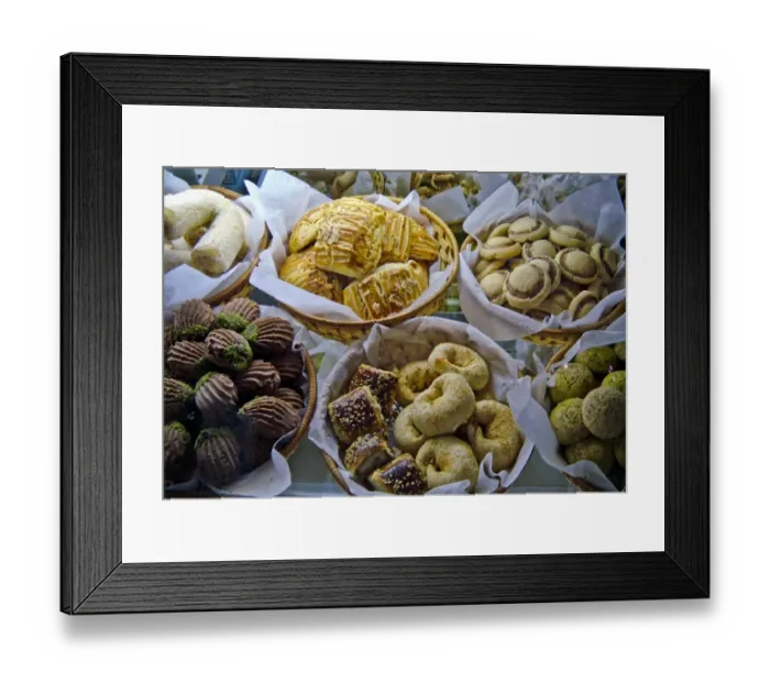 Framed Print : Selection of cakes, cookies and biscuits in display case of patisserie cafe in resort Framed Print : Selection of cakes, cookies and biscuits in display case of patisserie cafe in resort