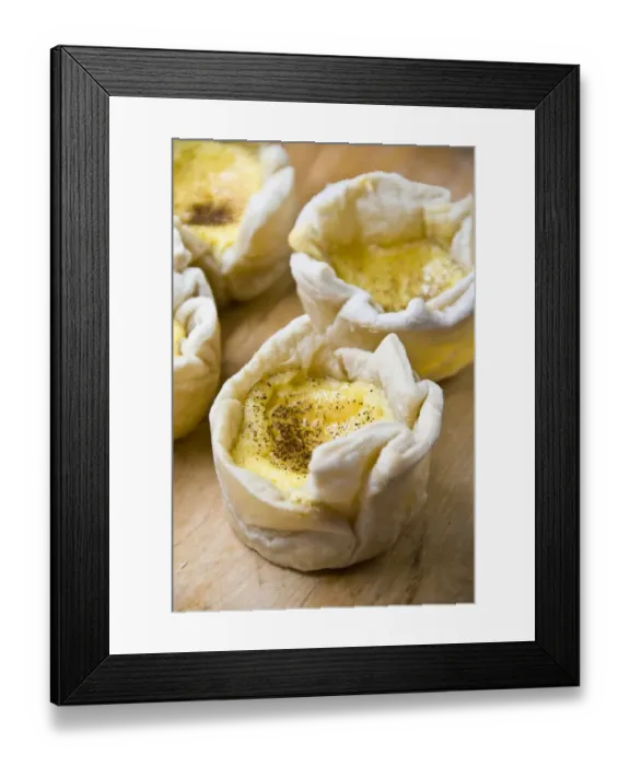 Framed Print : Home made portuguese style custard tarts with confectioners custard and puff pastry credit Framed Print : Home made portuguese style custard tarts with confectioners custard and puff pastry credit