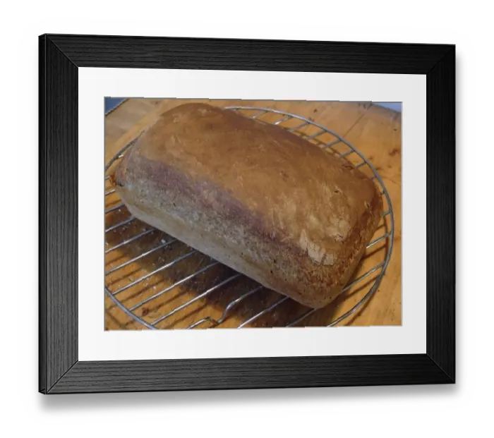 Framed Print : Home made brown wholemeal loaf fresh from oven on cooling rack. credit: Marie-Louise Framed Print : Home made brown wholemeal loaf fresh from oven on cooling rack. credit: Marie-Louise