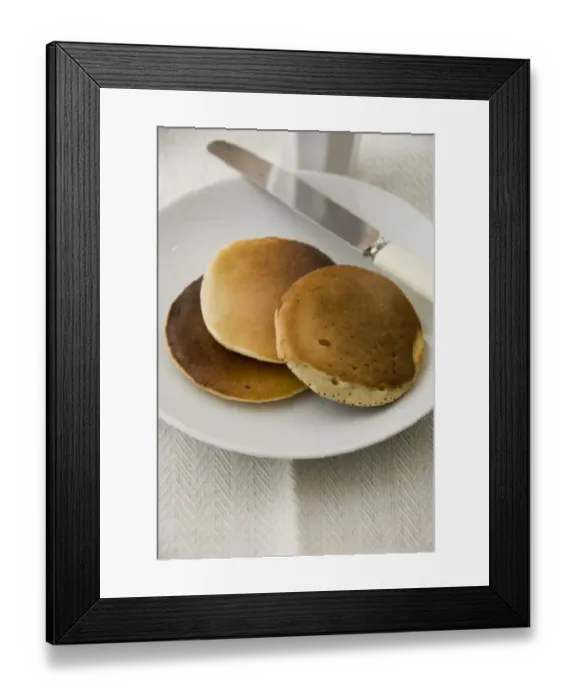 Framed Print : Three Scotch pancakes on a white plate credit: Marie-Louise Avery  /  thePictureKitchen