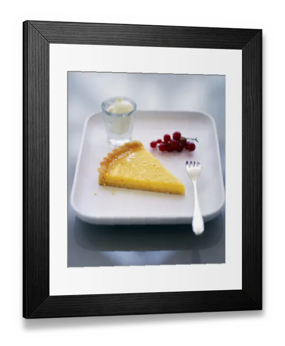 Framed Print : Slice of classic lemon tart served with fresh redcurrants, lemon zest and creme fraiche credit Framed Print : Slice of classic lemon tart served with fresh redcurrants, lemon zest and creme fraiche credit