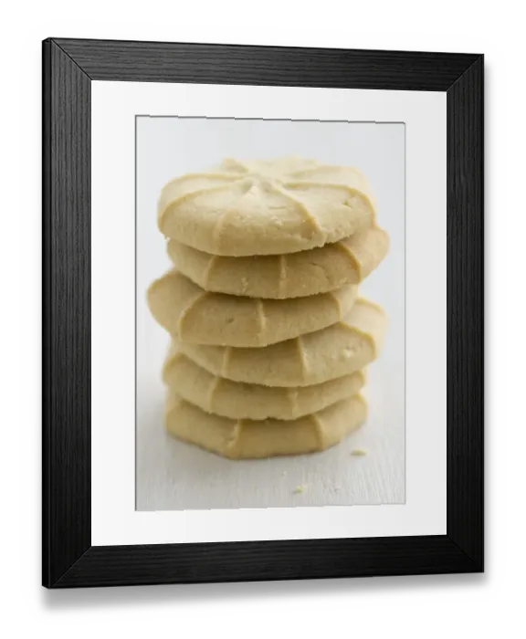 Framed Print : Stack of piped cookies credit: Marie-Louise Avery  /  thePictureKitchen  /  TopFoto