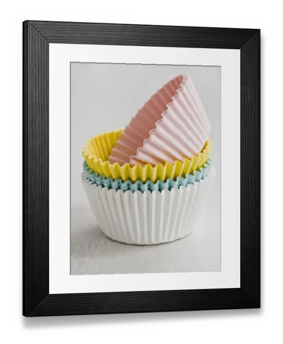 Framed Print : Stack of coloured paper cake and muffin cases credit: Marie-Louise Avery / thePictureKitchen Framed Print : Stack of coloured paper cake and muffin cases credit: Marie-Louise Avery / thePictureKitchen