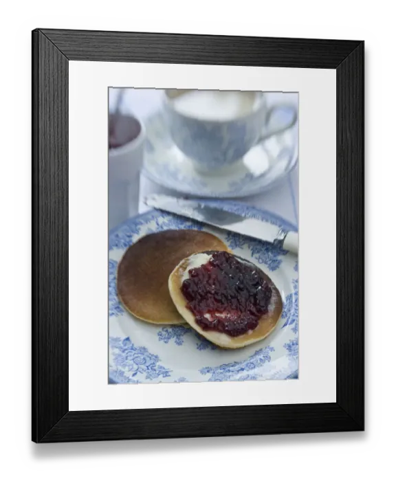 Framed Print : Teatime setting with scotch pancakes and raspberry jam credit: Marie-Louise Avery Framed Print : Teatime setting with scotch pancakes and raspberry jam credit: Marie-Louise Avery