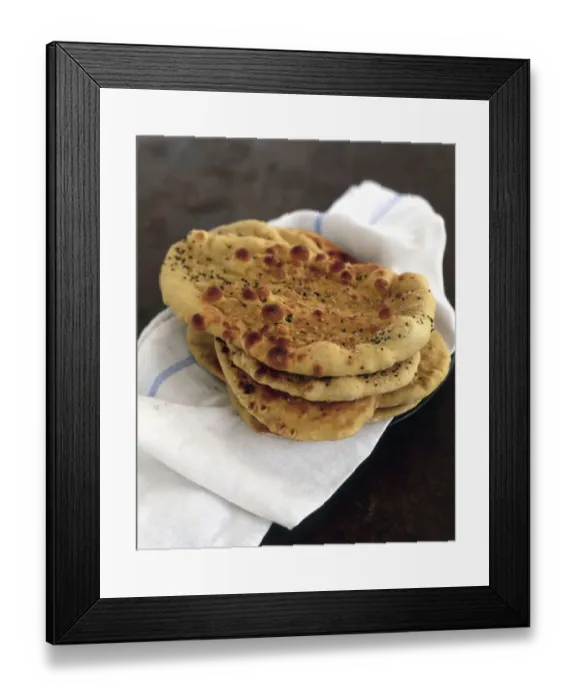 Framed Print : Pile of Indian naan bread on fresh white cloth Framed Print : Pile of Indian naan bread on fresh white cloth
