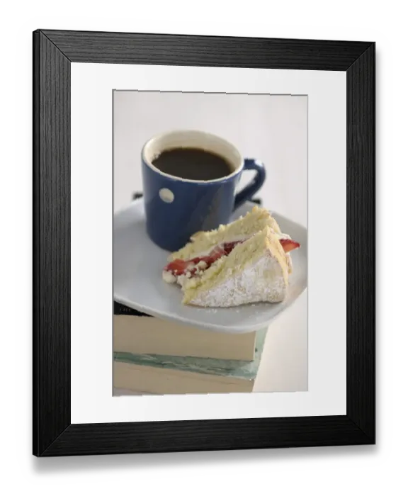Framed Print : A piece of strawberry sponge cake on a white plate with a small blue and white spotted Framed Print : A piece of strawberry sponge cake on a white plate with a small blue and white spotted