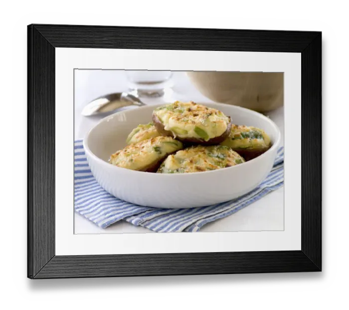 Framed Print : Halved baking potatoes baked with topping of cheese and spring onions credit: Marie-Louise Framed Print : Halved baking potatoes baked with topping of cheese and spring onions credit: Marie-Louise