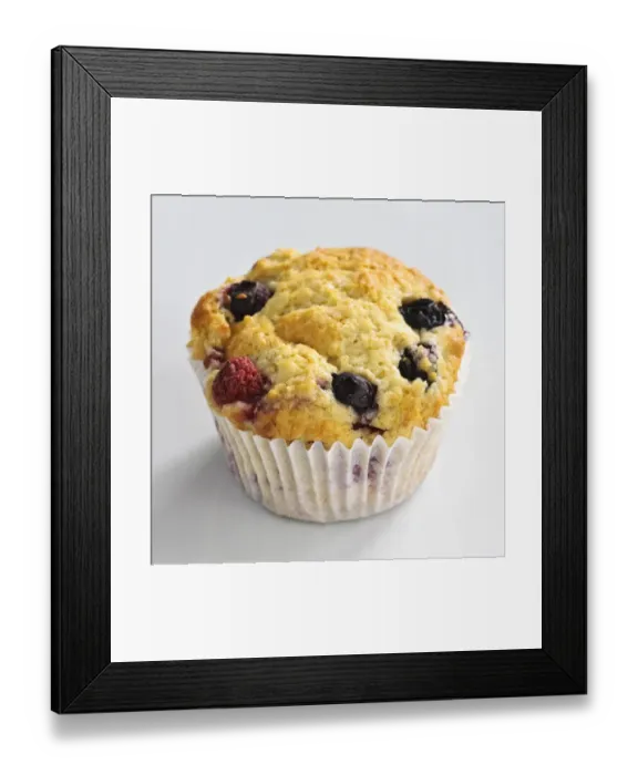 Framed Print : MIxed berry muffin with blueberries and raspberries in paper case credit: Marie-Louise Framed Print : MIxed berry muffin with blueberries and raspberries in paper case credit: Marie-Louise