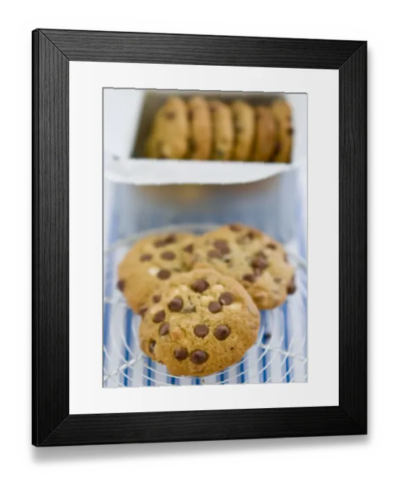 Framed Print : Chocolate chip cookies on cooling rack credit: Marie-Louise Avery / thePictureKitchen Framed Print : Chocolate chip cookies on cooling rack credit: Marie-Louise Avery / thePictureKitchen
