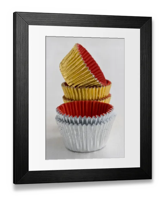 Framed Print : Stack of decorative metallic foil cake and muffin cases credit: Marie-Louise Avery Framed Print : Stack of decorative metallic foil cake and muffin cases credit: Marie-Louise Avery
