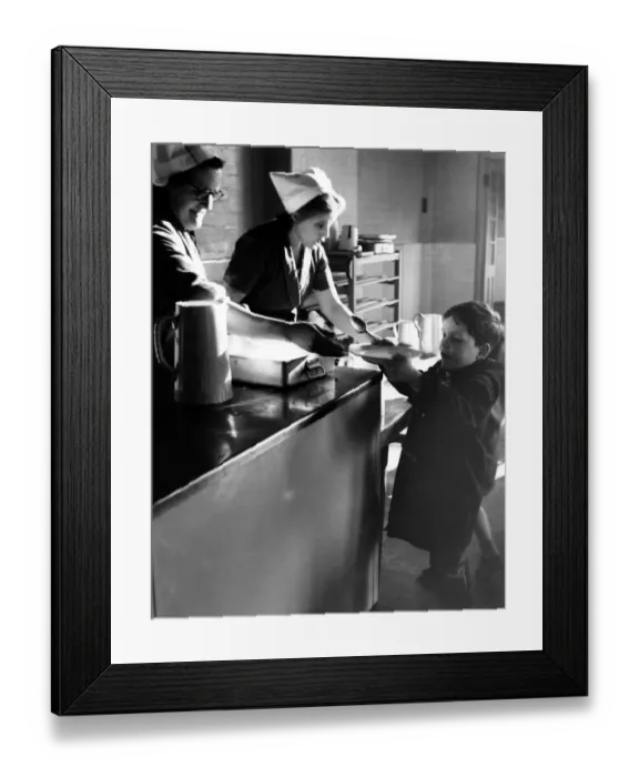 Framed Print : School dinners being served at a holiday play centre, set up at Creek Manor Secondary School Framed Print : School dinners being served at a holiday play centre, set up at Creek Manor Secondary School