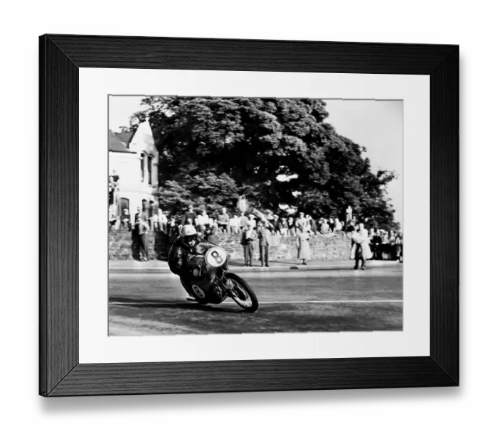 Framed Print : Isle of Man: N Taniguchi of Japan takes the corner at speed, riding a 125cc Japanese honda Framed Print : Isle of Man: N Taniguchi of Japan takes the corner at speed, riding a 125cc Japanese honda