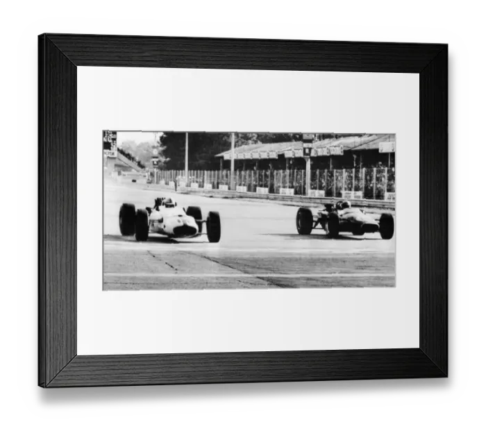 Framed Print : John Surtees beating Jack Brabham by a car length in the Italian Grand Prix at Monza