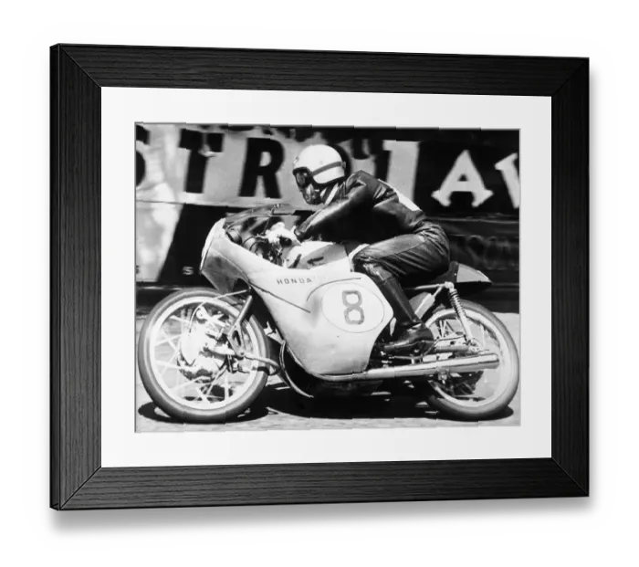 Framed Print : Isle of Man: Japanese rider Taniguchi on a Honda machine racing round the Manx track Framed Print : Isle of Man: Japanese rider Taniguchi on a Honda machine racing round the Manx track