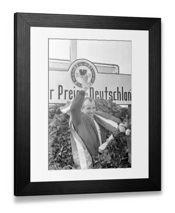 Framed Print : John Surtees celebrates victory for Ferrari in the German Grand Prix at Nurburgring Framed Print : John Surtees celebrates victory for Ferrari in the German Grand Prix at Nurburgring