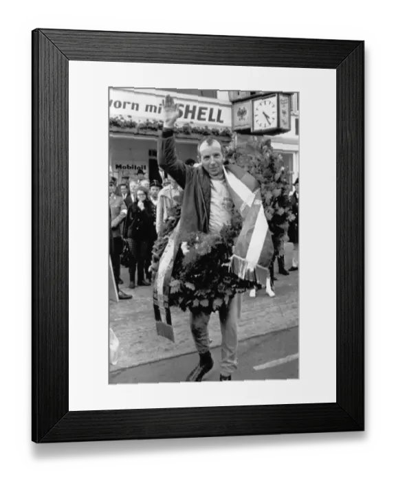 Framed Print : John Surtees happy winner of the Nurburgring Grand Prix. It was his first Ferrari win