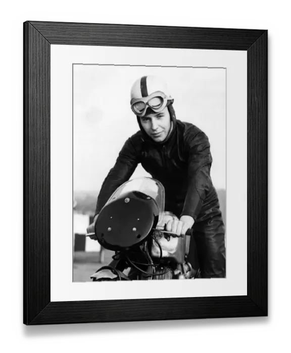 Framed Print : John Surtees practising at Brands Hatch on his Norton motorbike. He is trying to