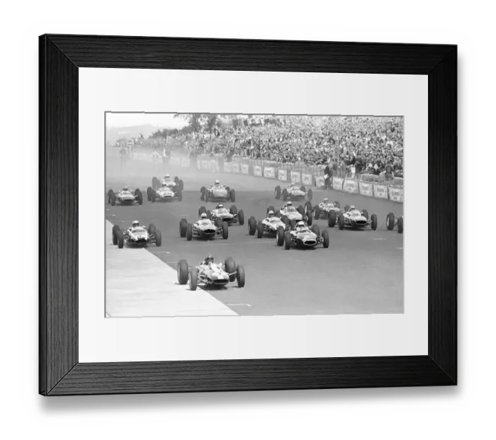 Framed Print : John Surtees storms away at the front of the German Grand Prix Nurburgring which