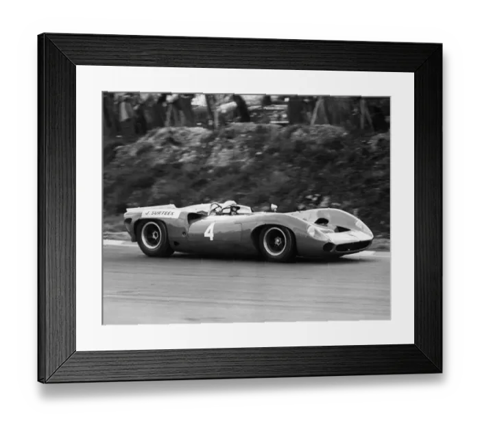 Framed Print : John Surtees No 4, driving a Lola 70 Chevrolet. He won both heats of the Guards