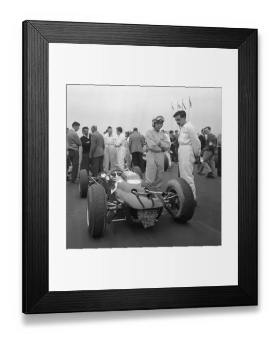 Framed Print : John Surtees stands next to his Lola Climax awaiting the start of the Goodwood International Framed Print : John Surtees stands next to his Lola Climax awaiting the start of the Goodwood International