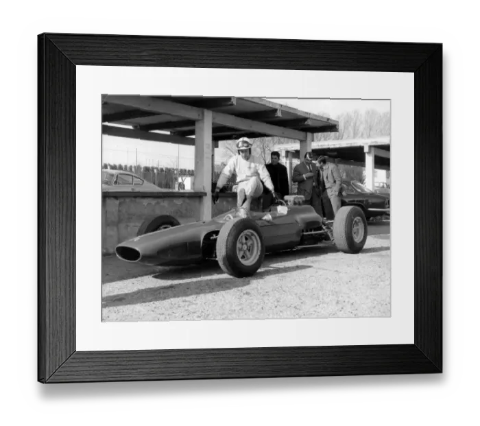 Framed Print : After his accident world famous auto racer John Surtees has stepped into a racing Framed Print : After his accident world famous auto racer John Surtees has stepped into a racing