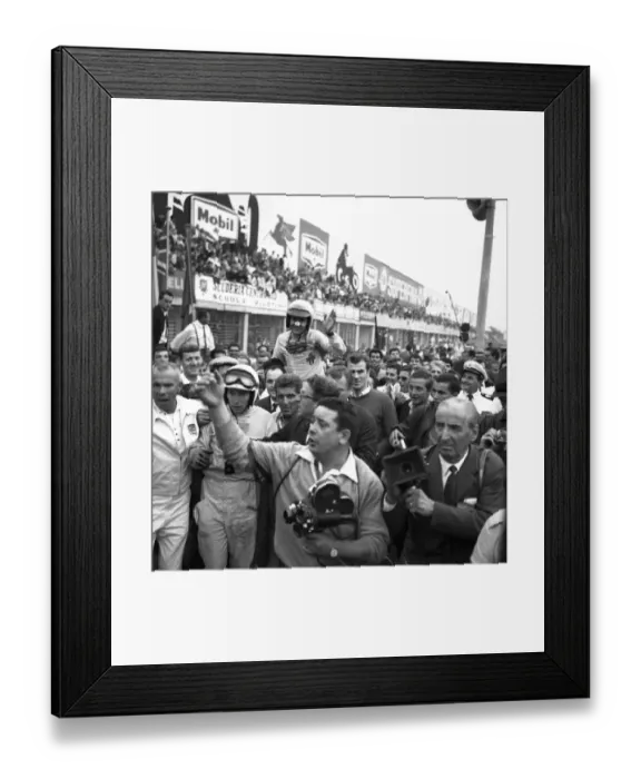Framed Print : John Surtees and Lorenzo Bandini are mobbed by spectators after the finish of Framed Print : John Surtees and Lorenzo Bandini are mobbed by spectators after the finish of