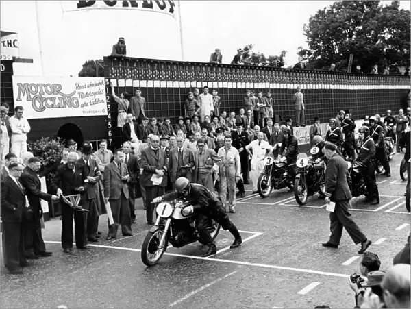 The start of the Senior TT trophy race at the Isle of Man. H L Daniell, is first to start