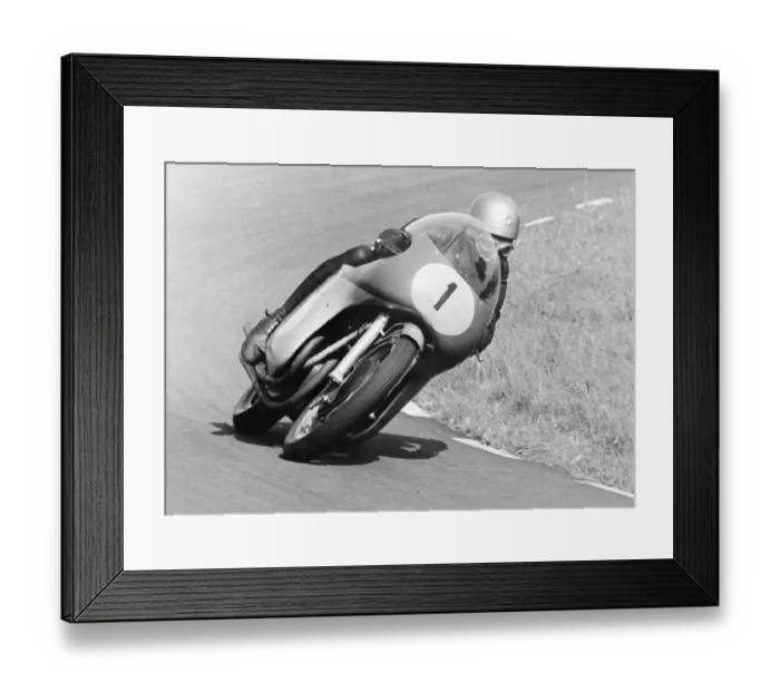 Framed Print : Assen, Holland: Rhodesian Motor-cycling ace, Gary Hocking taking an hairpin bend during the Dutch T