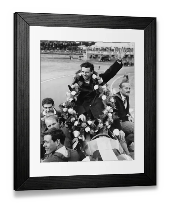Framed Print : Garlanded Jim Clark. Draped in the victory garland, World Champion Jim Clark of Scotland Framed Print : Garlanded Jim Clark. Draped in the victory garland, World Champion Jim Clark of Scotland