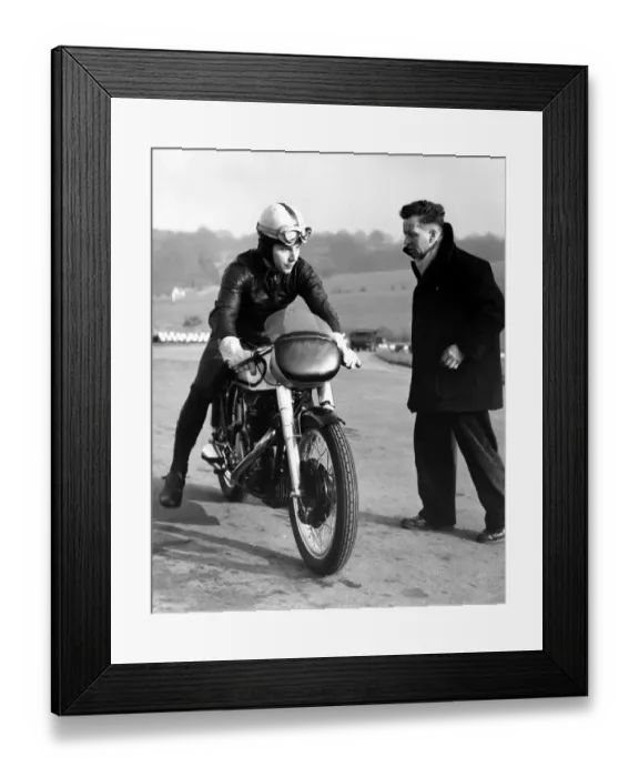 Framed Print : John Surtees practising at Brands Hatch on his Norton motorbike. He is trying to