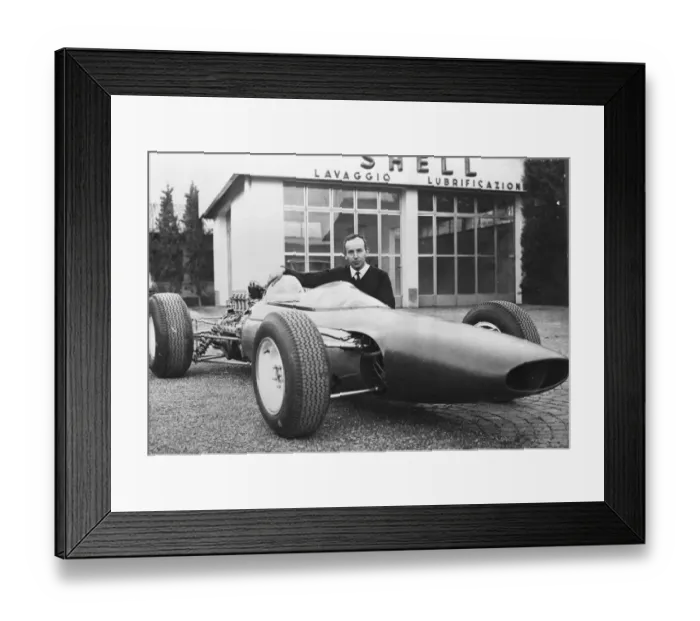 Framed Print : John Surtees pictured here with the new Ferrari Formula One racing car. April 7th Framed Print : John Surtees pictured here with the new Ferrari Formula One racing car. April 7th