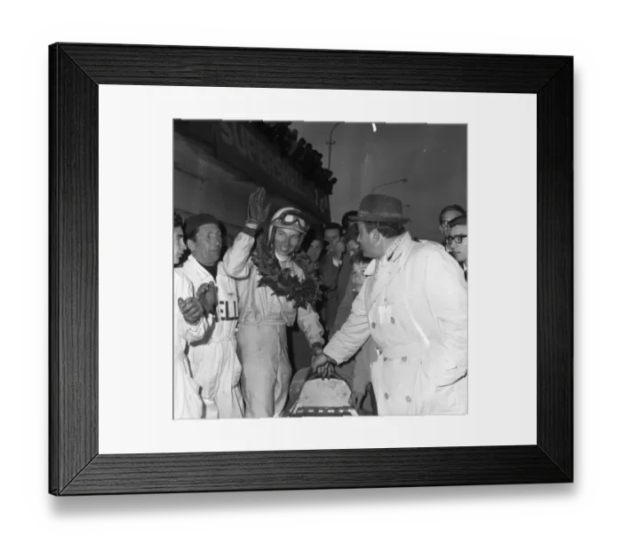Framed Print : John Surtees garlanded and cheered after his victory in the XIII Grand Prix Siracusa Framed Print : John Surtees garlanded and cheered after his victory in the XIII Grand Prix Siracusa